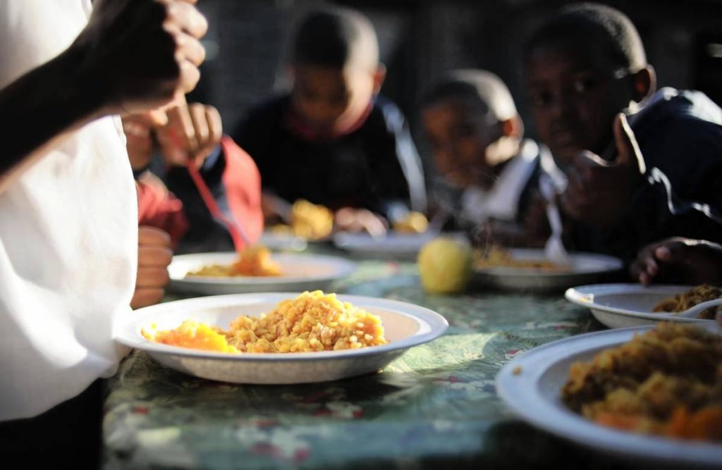 a child eating his school meal