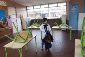 child in school classroom