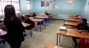 A teacher teaches her class during the Covid-19 pandemic.